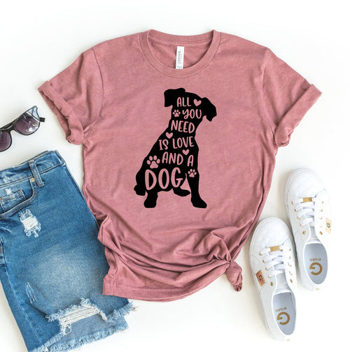 Woman wearing black All You Need is Love and a Dog T-shirt
